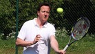 David Cameron playing tennis