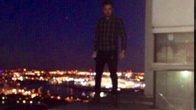 This picture of Liam Payne on the balcony ledge was published on his friend's Twitter feed