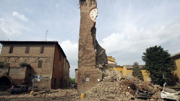 The old tower is seen collapsed after an earthquake in Finale Emilia