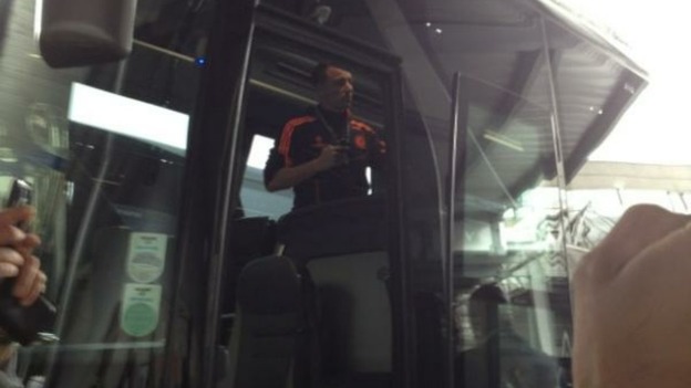 John Terry on the coach shortly after arriving back in Britain