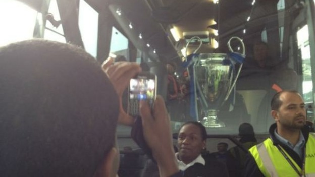 Staff at Heathrow have been taking pictures of themselves next to the cup
