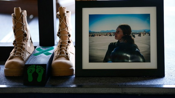 A photograph of, and boots belonging to, Staff Sgt Afton Ponce