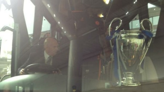 Chelsea and the Champions League cup are leaving Heathrow. The cup is delicately balanced.