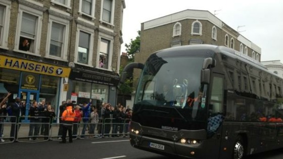 Chelsea  arrive at Stamford Bridge ahead of their parade
