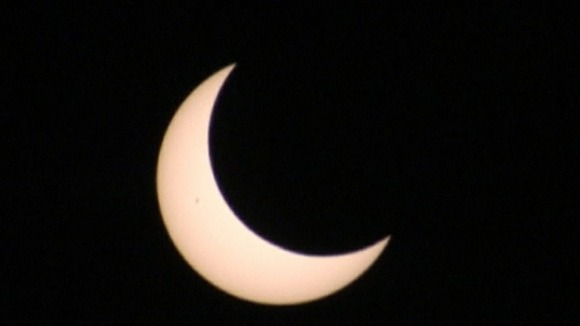 The moon moving across the sun's path as seen from China (1/3)