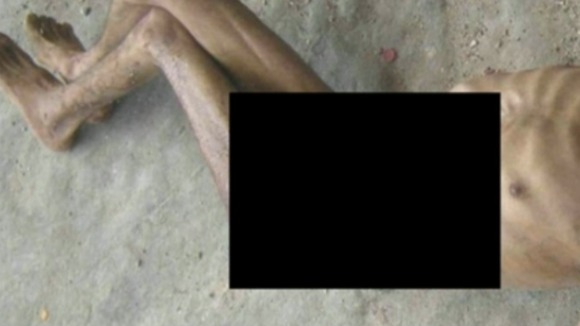 Photo purporting to show a dead prisoner (comments are from the Cart-Ruck report)