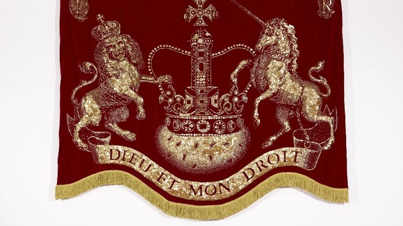 A version of the royal coat-of-arms made from more than half a million gold-coloured buttons will hang on 'The Spirit of Chartwell'