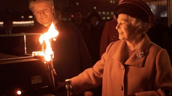 The Queen lighting the Golden Jubilee Beacon in London in 2002
