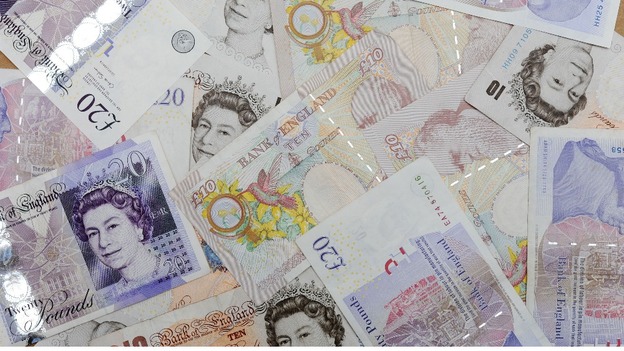 A pile of British bank notes