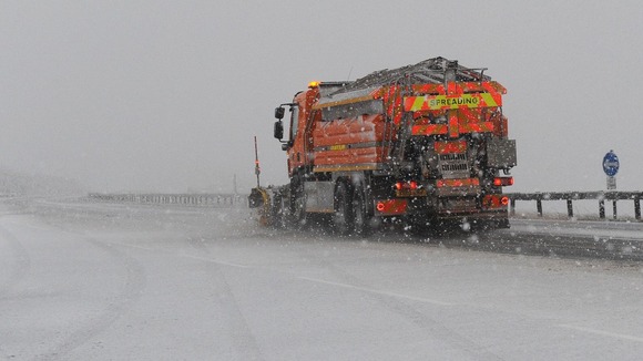 A snow plough clears the A66