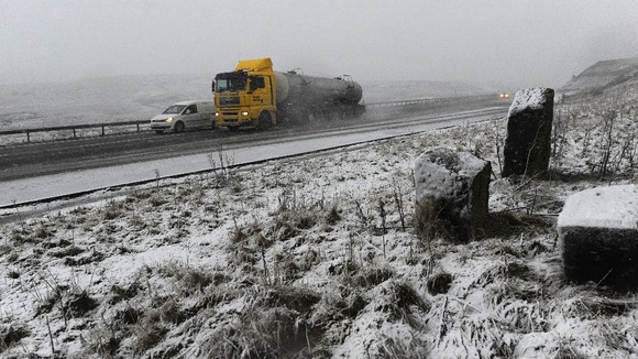 Traffic makes its way through snow in the Northern Pennines