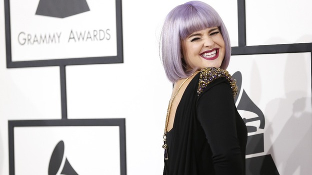 Television personality Kelly Osbourne arrives at the 56th annual Grammy Awards.