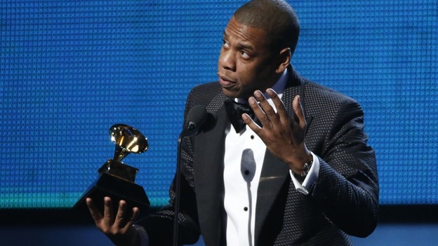 Jay-Z accepts the award for Best Rap Song for "Holy Grail" at the 56th annual Grammy Awards.