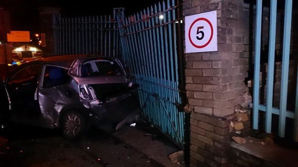One of the cars also smashed into a wall and some gates