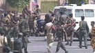 Members of Yemen's armed forces attend to the wounded