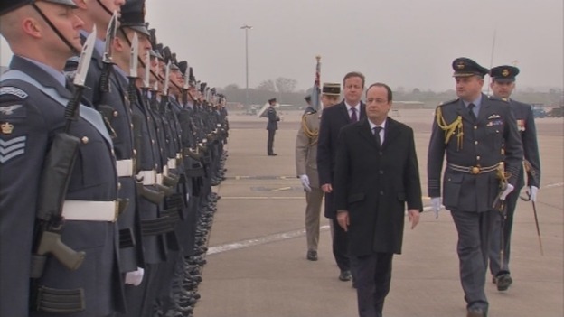 President Francois Hollande and David Cameron take part in a kit inspection.