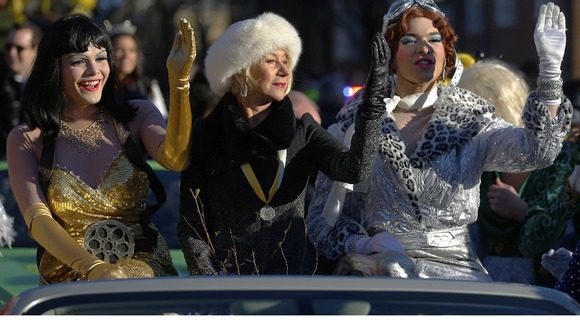 Helen Mirren gives a regal wave with Hasty Pudding Theatricals' president and vice president