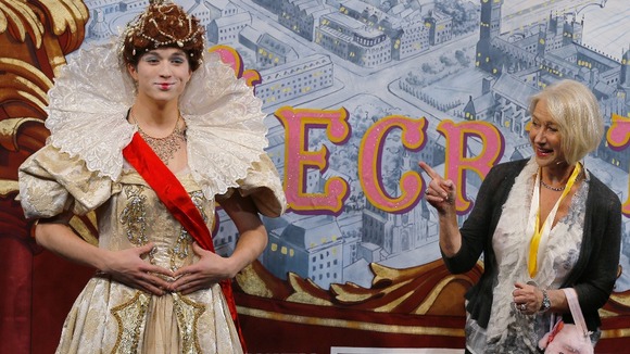 Helen Mirren is joined onstage by a student actor playing the role of Queen Elizabeth I