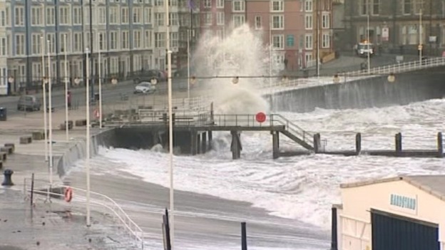Large waves crash against Aberystwyth promenade