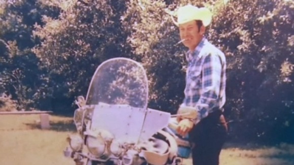 A younger Billy Standley with his Harley Davidson motorcycle