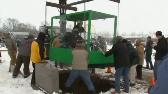 Billy Standley is lowered into his grave on his 1967 Electra Glide cruiser