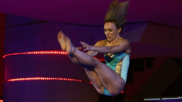 TV presenter Michaela Strachan springs from the 5m.