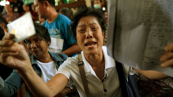 Protesters demanding the right to vote at a district office where voting was called off in Bangkok