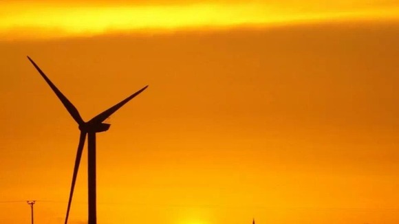 Sunset with wind turbine at Chatteris Fen in Cambridgeshire