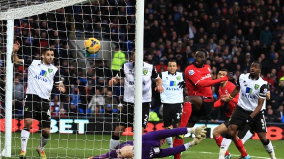 Kenwyne Jones bundles home the winning goal.