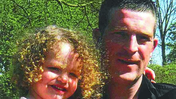 Jonathan Turner, who died after an attack in Mansfield, and his daughter, Maisie.