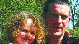 Jonathan Turner, who died after an attack in Mansfield, and his daughter, Maisie.