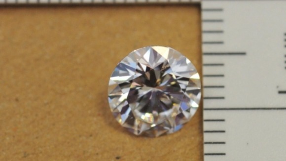Diamonds valued at £100,000 were found in the safe deposit boxes.