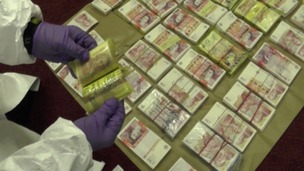 £500,000 in cash was found in the safe deposit boxes.