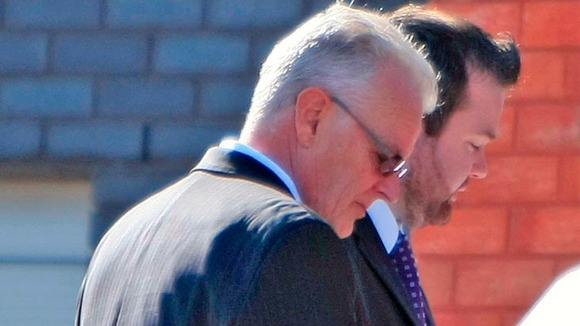 Ian Maxwell entering court