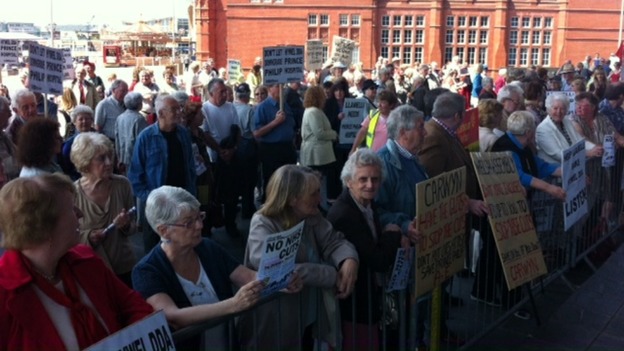 People protesting outside the Senedd