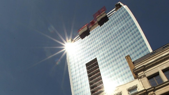 The sun reflects off the 'Walkie Talkie' building on Fenchurch Street