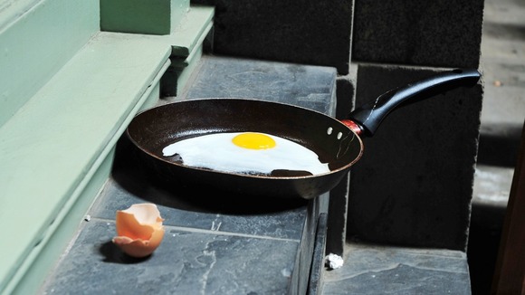 An egg is fried in intense sunlight reflected from the Walkie Talkie building