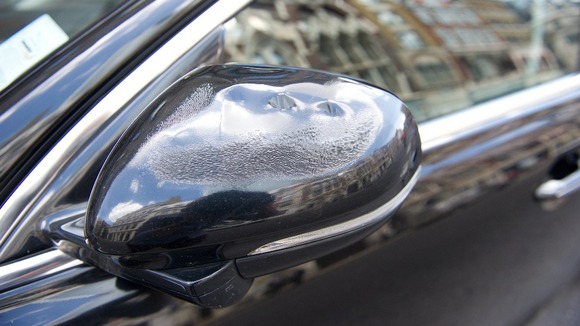 Damage to a Jaguar wing mirror caused by the reflected sunlight