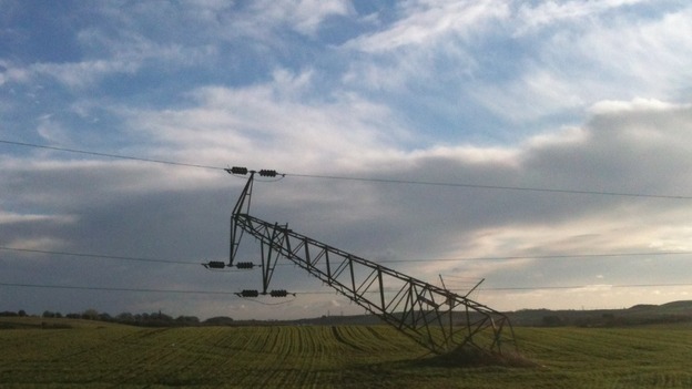 Electricity pylon bears the brunt of strong winds.