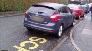 Cars parked on zig zag lines outside schools.