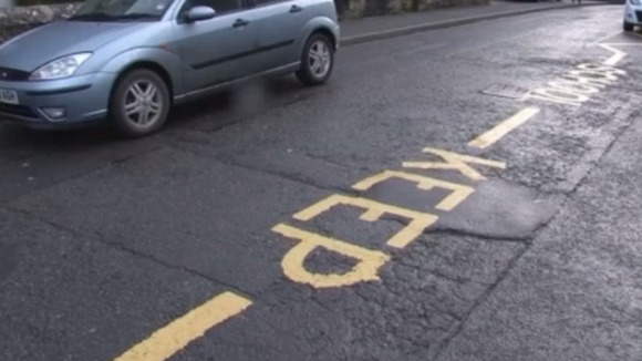 The markings are on the road, but the message cannot be enforced.
