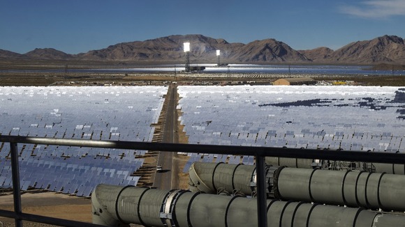 The heliostat mirrors reflect the sky.