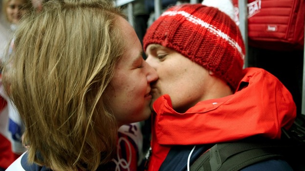 Ms Yarnold received a congratulatory kiss from her boyfriend after the victory