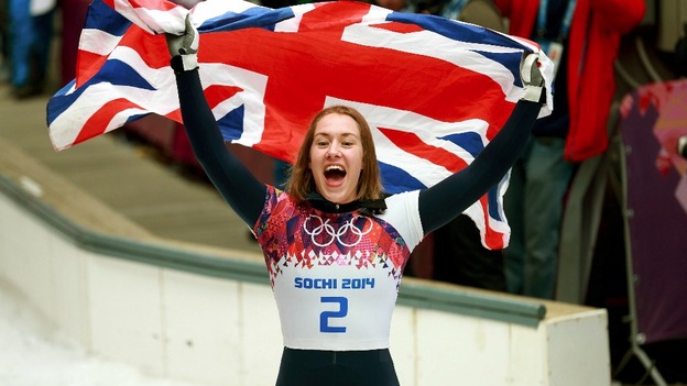 Ms Yarnold flew the union flag with pride after her win