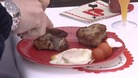 Heart-shaped sausages, cooked in a train engine.