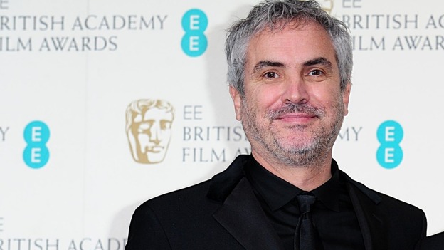Director of 'Gravity', Alfonso Cuarón, wins the award for best director at the Baftas.