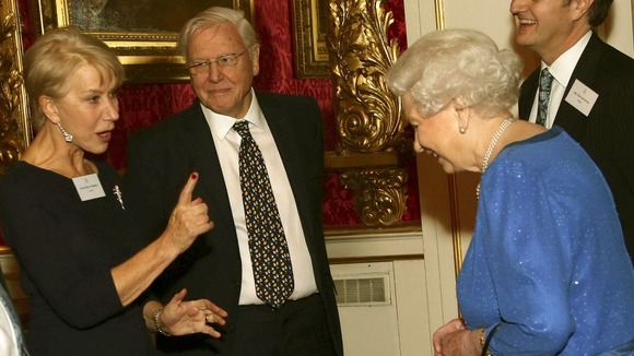 Dame Helen Mirren speaks to the Queen as Sir David Attenborough looks on.