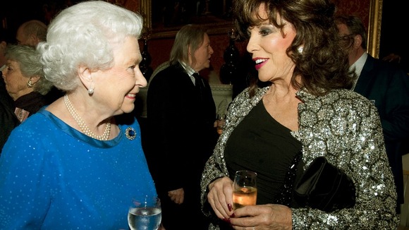 The Queen and Joan Collins at the Buckingham Palace reception.