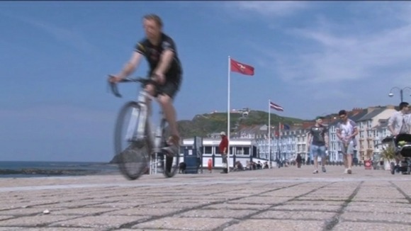A cyclist on Aberystwyth seafront