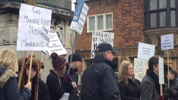 The campaigners gather outside Hatfield House today.